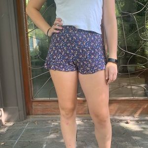 Blue floral shirts with yellow and red flowers